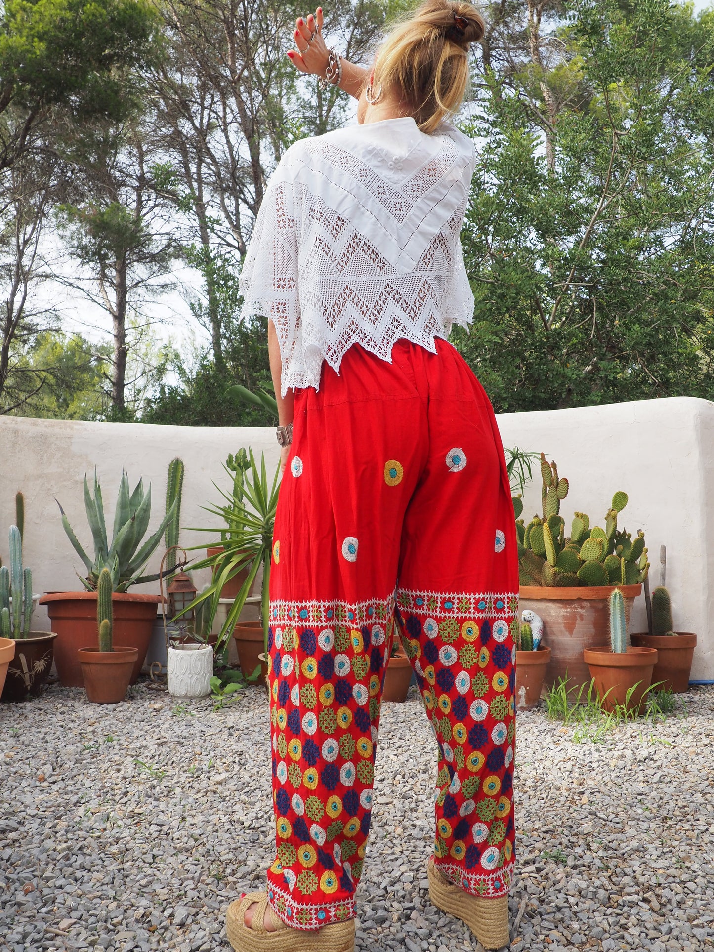 Original vintage 1970’s Indian hand embroidered pants on bright red cotton textiles and a draw string waist very cool