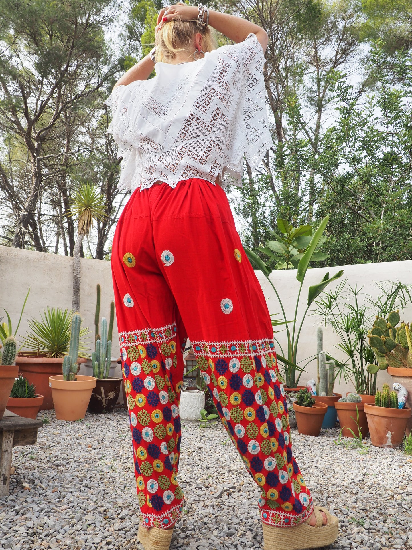 Original vintage 1970’s Indian hand embroidered pants on bright red cotton textiles and a draw string waist very cool