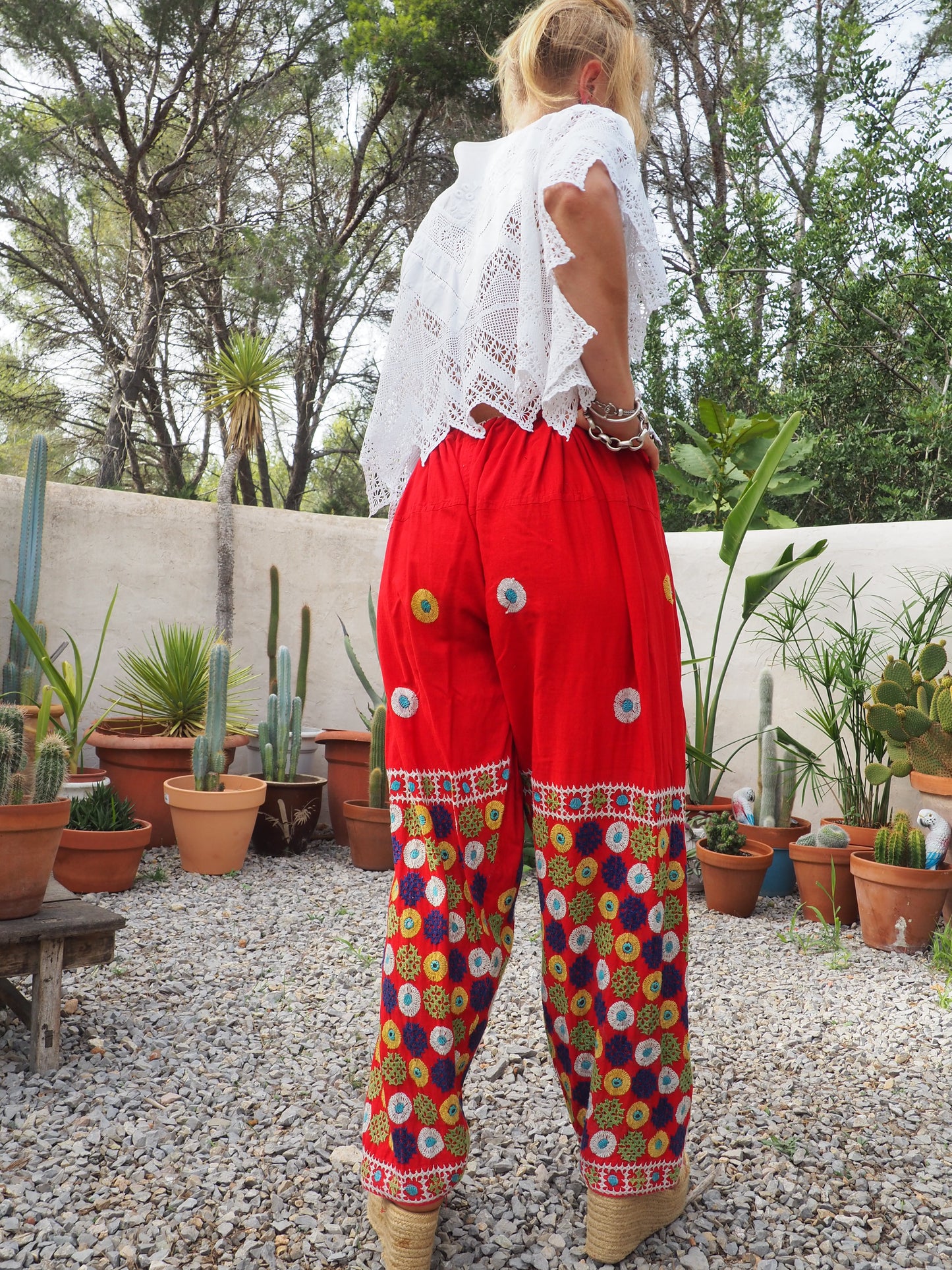Original vintage 1970’s Indian hand embroidered pants on bright red cotton textiles and a draw string waist very cool