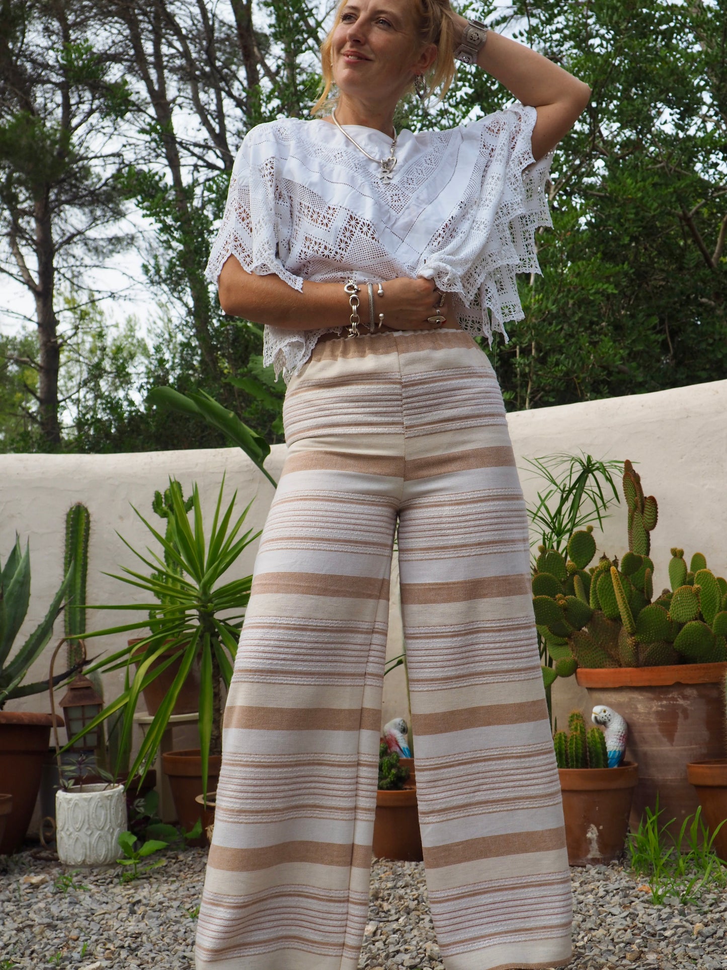 Vintage think woven textiles up-cycled wide leg pants with cream and off white striped design and elasticated waist.