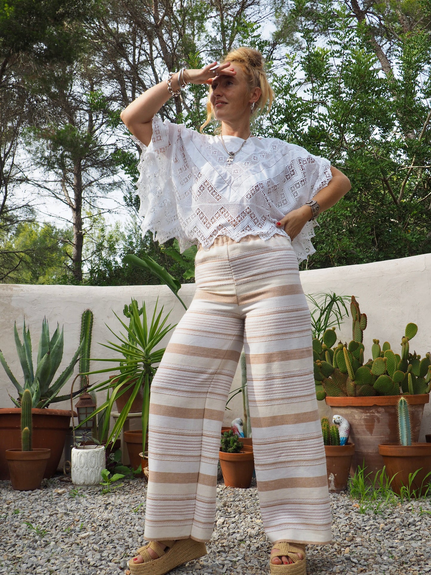 Vintage think woven textiles up-cycled wide leg pants with cream and off white striped design and elasticated waist.