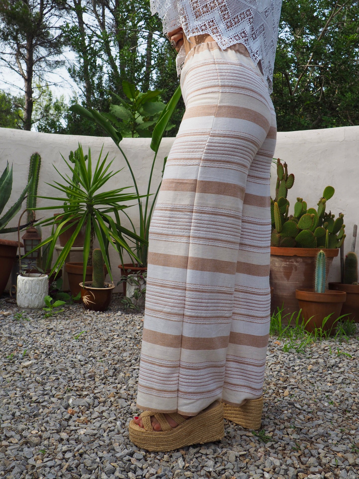 Vintage think woven textiles up-cycled wide leg pants with cream and off white striped design and elasticated waist.