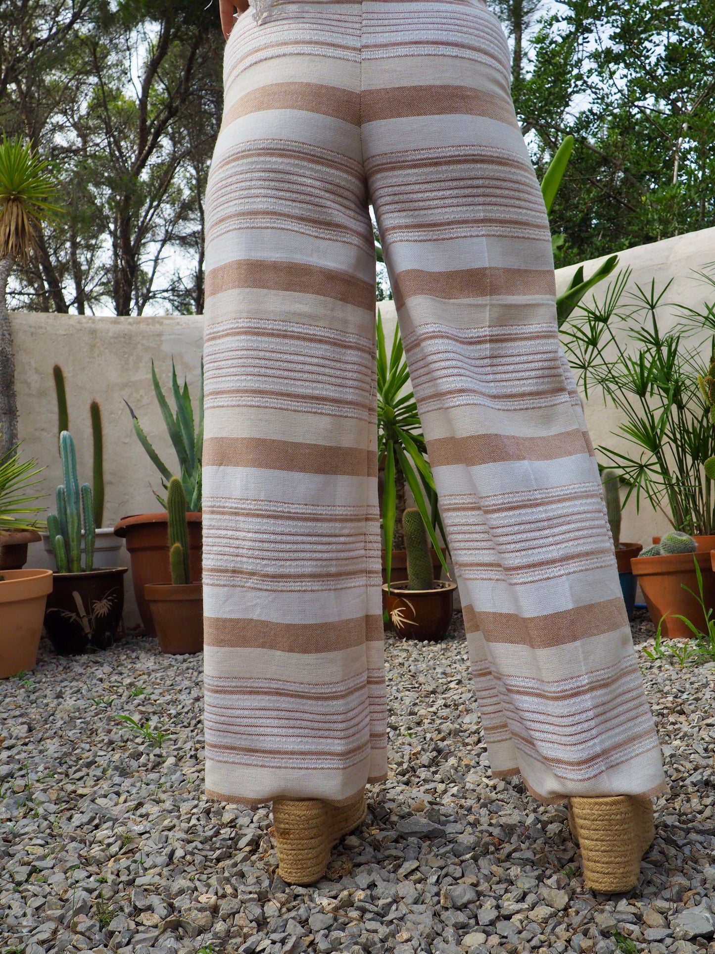 Vintage think woven textiles up-cycled wide leg pants with cream and off white striped design and elasticated waist.