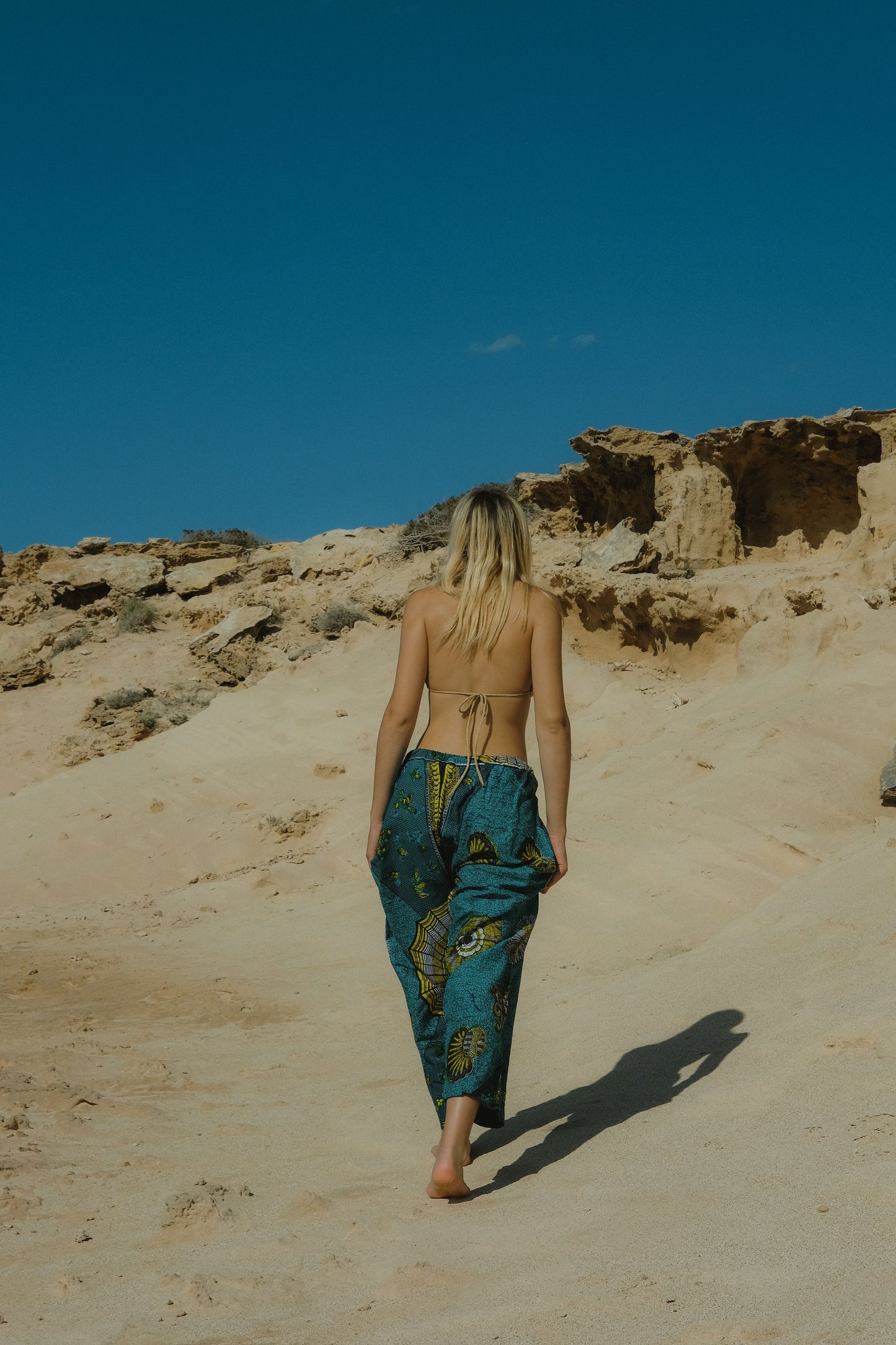 Vintage African screen printed pants with blue and yellow geometric design