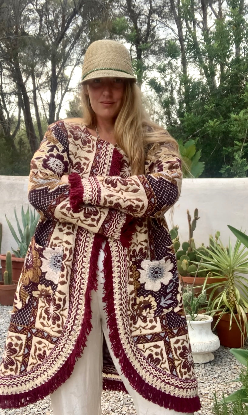 Up-cycled vintage blanket jackets by Vagabond Ibiza with a brown and cream woven outside textiles lined with patterns fleece