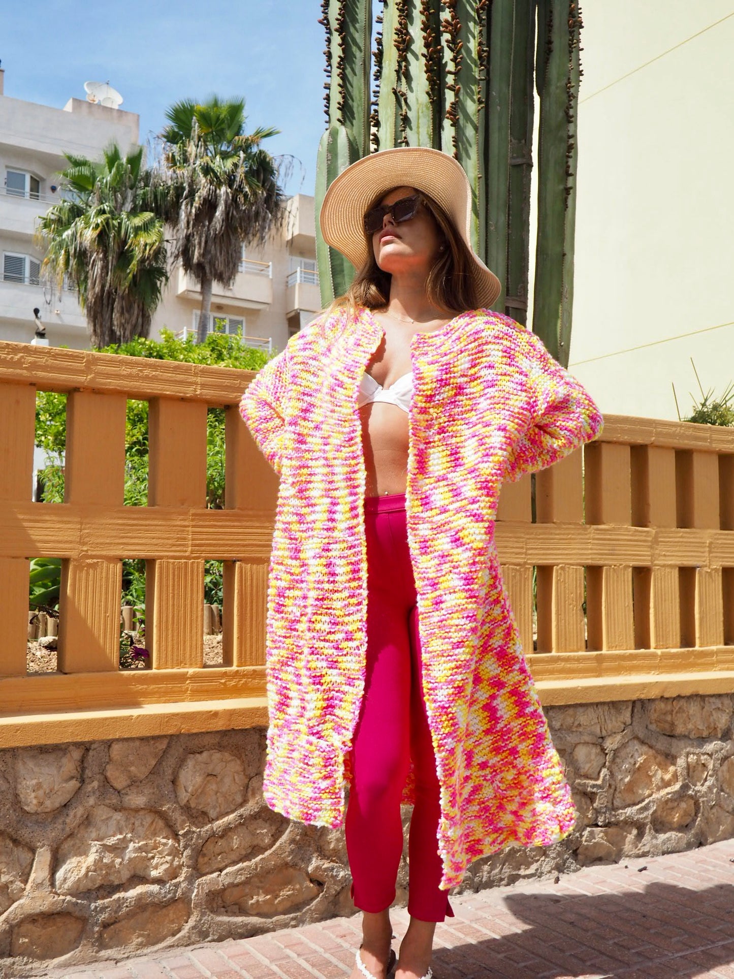 Hand knitted pink and yellow jacket made in ibiza by Vagabond Ibiza