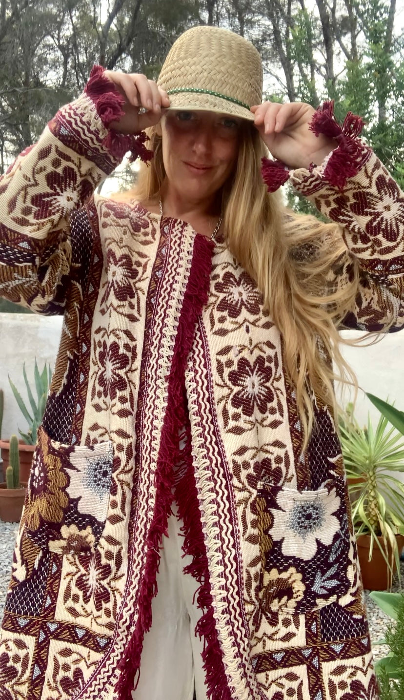 Up-cycled vintage blanket jackets by Vagabond Ibiza with a brown and cream woven outside textiles lined with patterns fleece