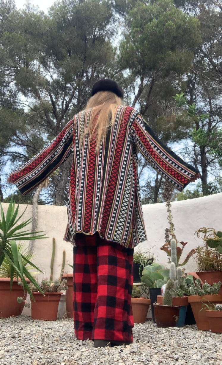 Hand woven Moroccan up-cycled blanket jacket made by Vagabond Ibiza with black white and red striped design