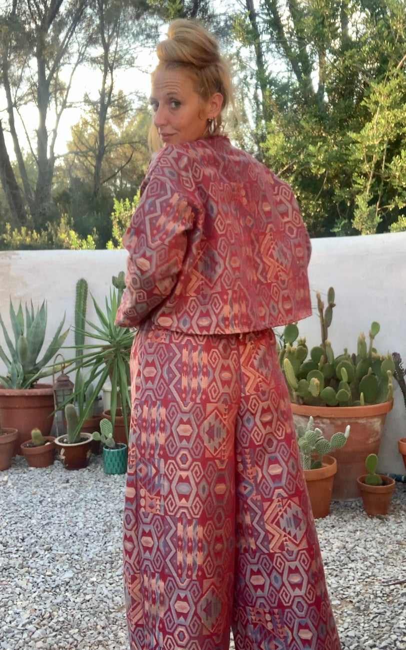 Very cool 1970’s upholstery fabrics in burgundy and blue tones wide leg pants by Vagabond Ibiza from recycled dead stock fabrics or