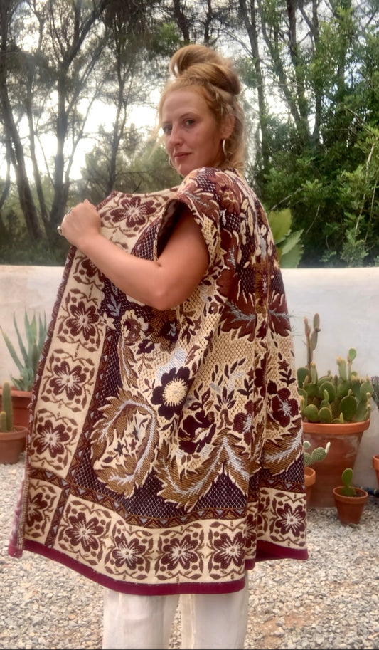 Up-cycled vintage blanket waistcoat jackets by Vagabond Ibiza with a brown and cream woven outside textiles lined with patterns fleece