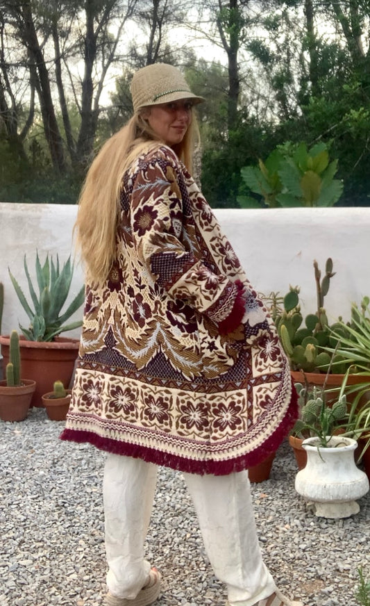 Up-cycled vintage blanket jackets by Vagabond Ibiza with a brown and cream woven outside textiles lined with patterns fleece