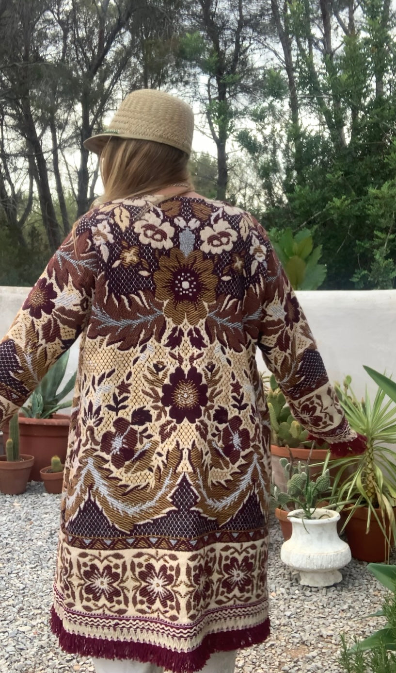 Up-cycled vintage blanket jackets by Vagabond Ibiza with a brown and cream woven outside textiles lined with patterns fleece