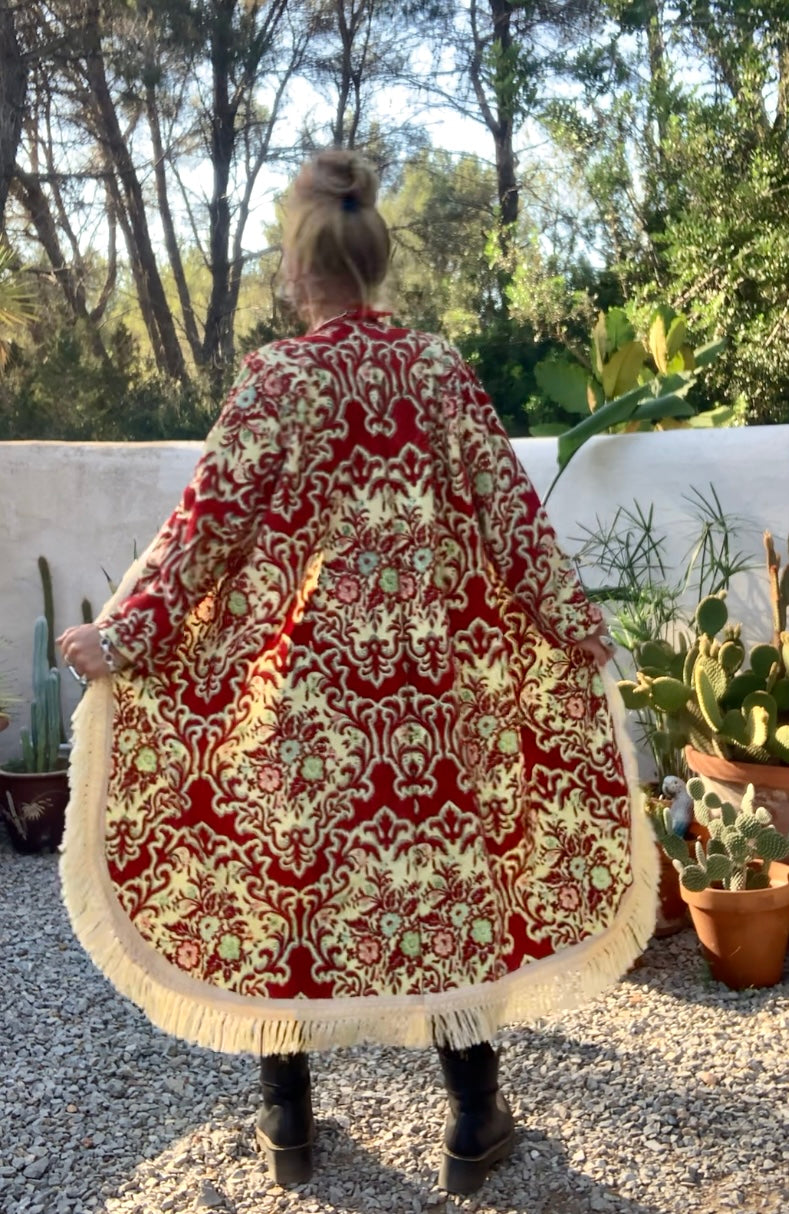 Vintage red and pastel yellow textiles with a burnet out devore Damascus pattern on the velvets pile very special textiles with tassel trim