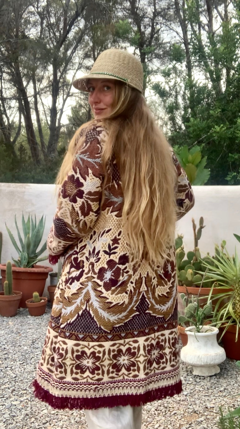 Up-cycled vintage blanket jackets by Vagabond Ibiza with a brown and cream woven outside textiles lined with patterns fleece