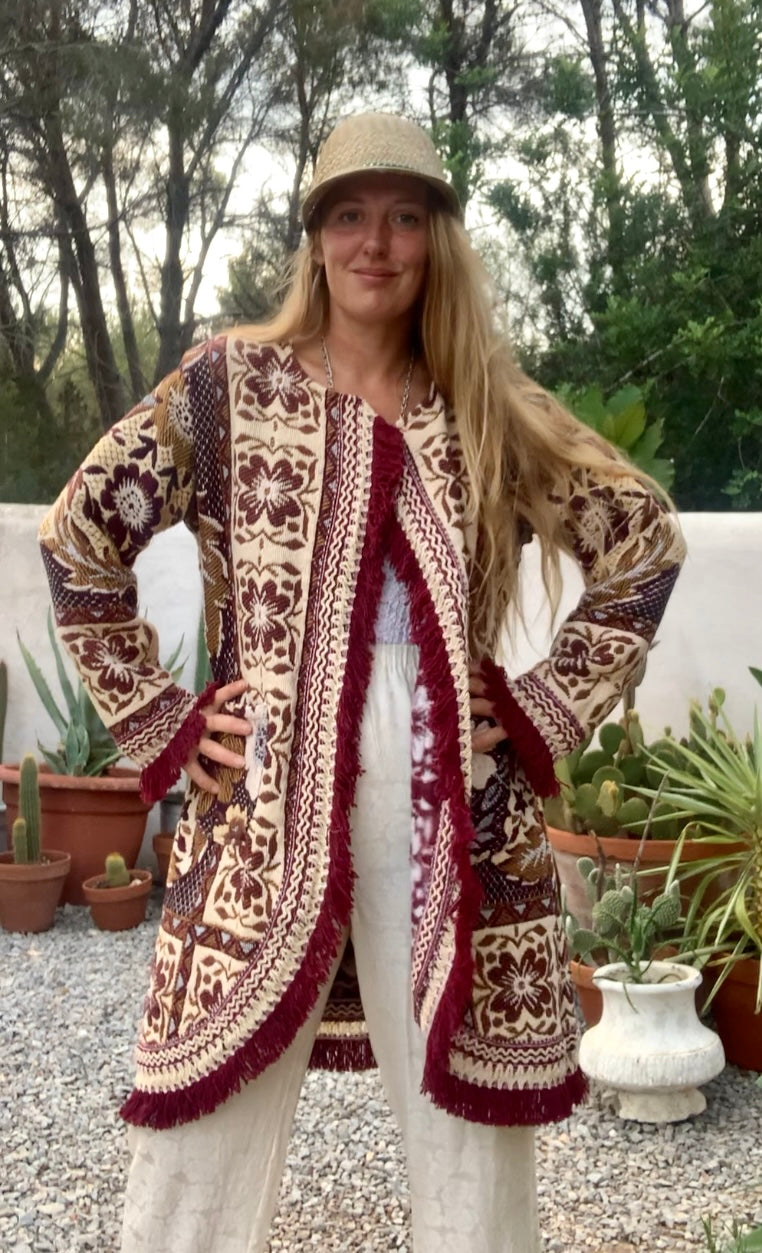 Up-cycled vintage blanket jackets by Vagabond Ibiza with a brown and cream woven outside textiles lined with patterns fleece