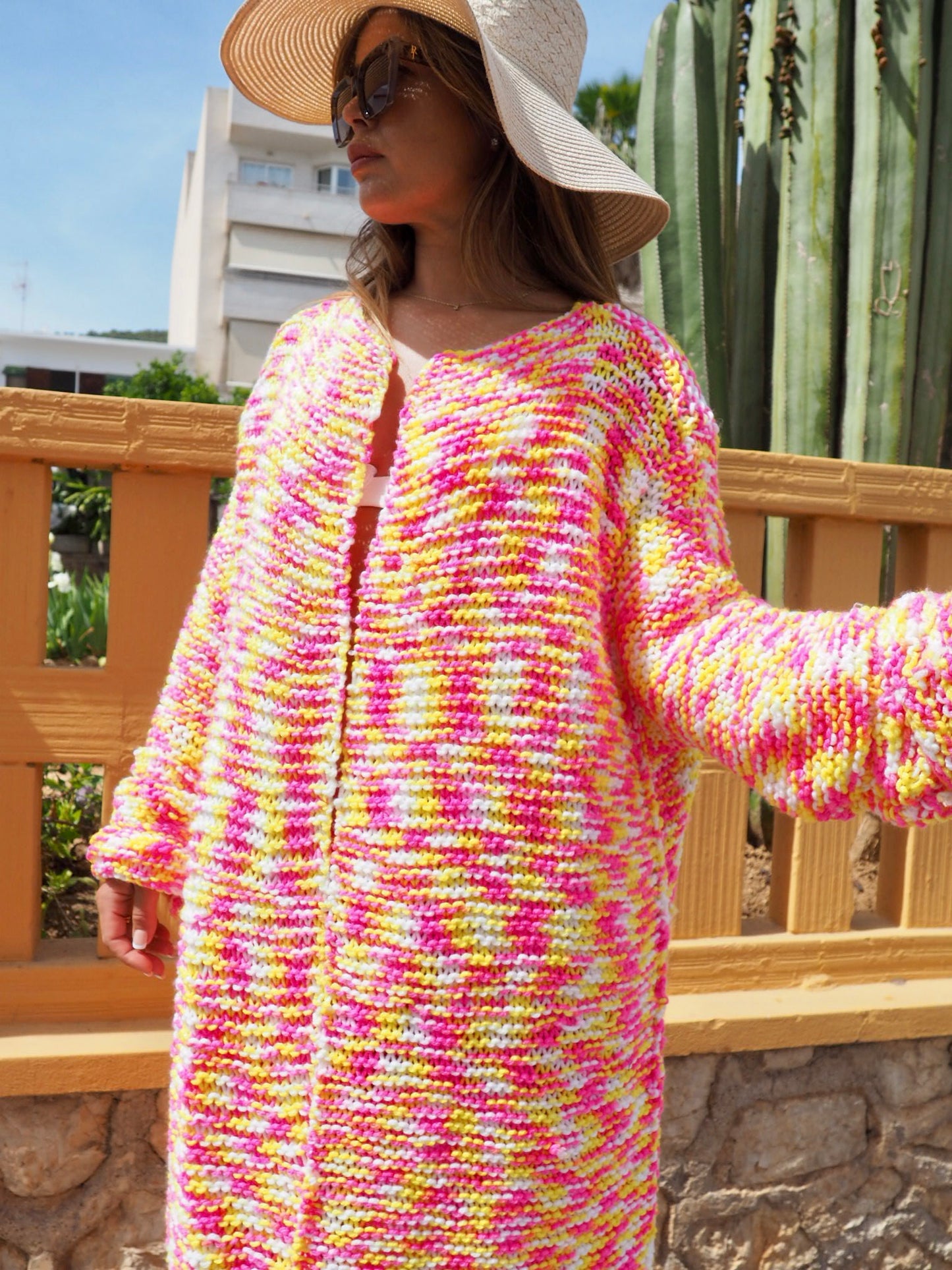 Hand knitted pink and yellow jacket made in ibiza by Vagabond Ibiza