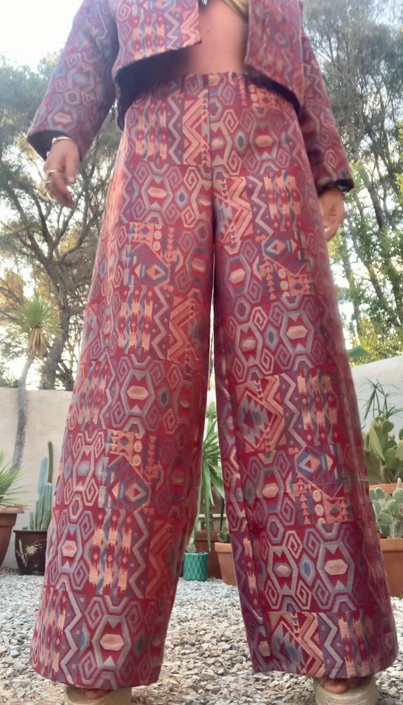 Very cool 1970’s upholstery fabrics in burgundy wide cropped long sleeve jackets made by Vagabond Ibiza from recycled dead stock fabrics by Vagabond Ibiza