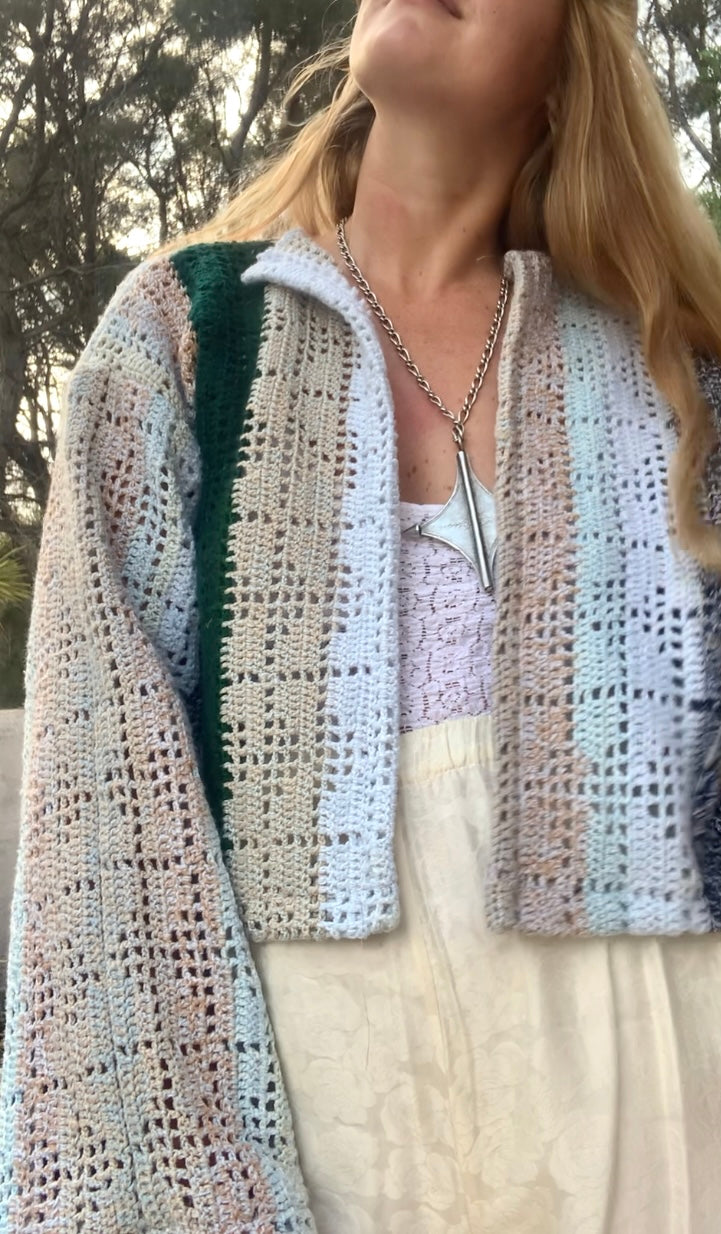 Up-cycled vintage crochet cropped jacket made by Vagabond Ibiza with pastel tones.