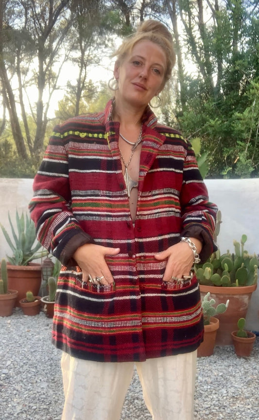 Original vintage woven Moroccan blanket jacket with red and black stripped design pockets and buttons up the front lined with black cotton