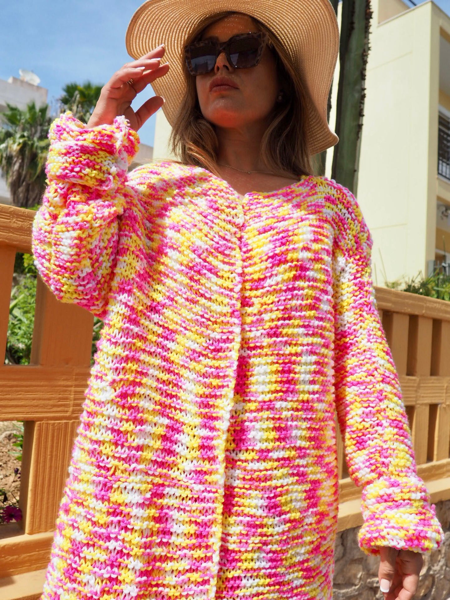 Hand knitted pink and yellow jacket made in ibiza by Vagabond Ibiza