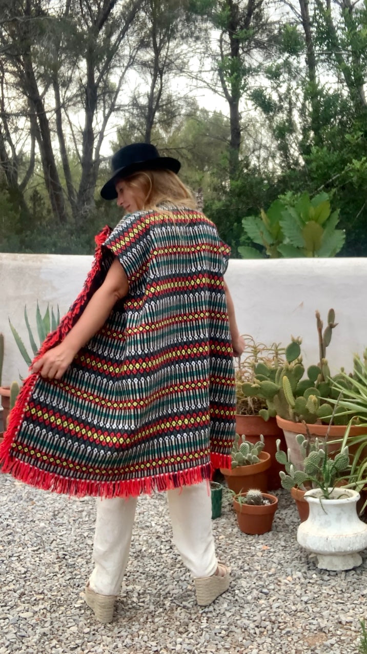 Up-cycled hand woven Morrocan textile waistcoat jacket by Vagabond Ibiza with red and black geometric design