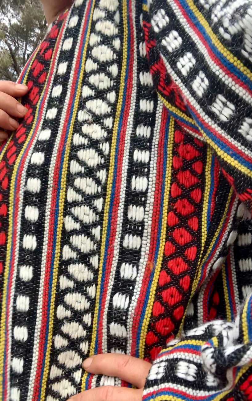 Hand woven Moroccan up-cycled blanket jacket made by Vagabond Ibiza with black white and red striped design