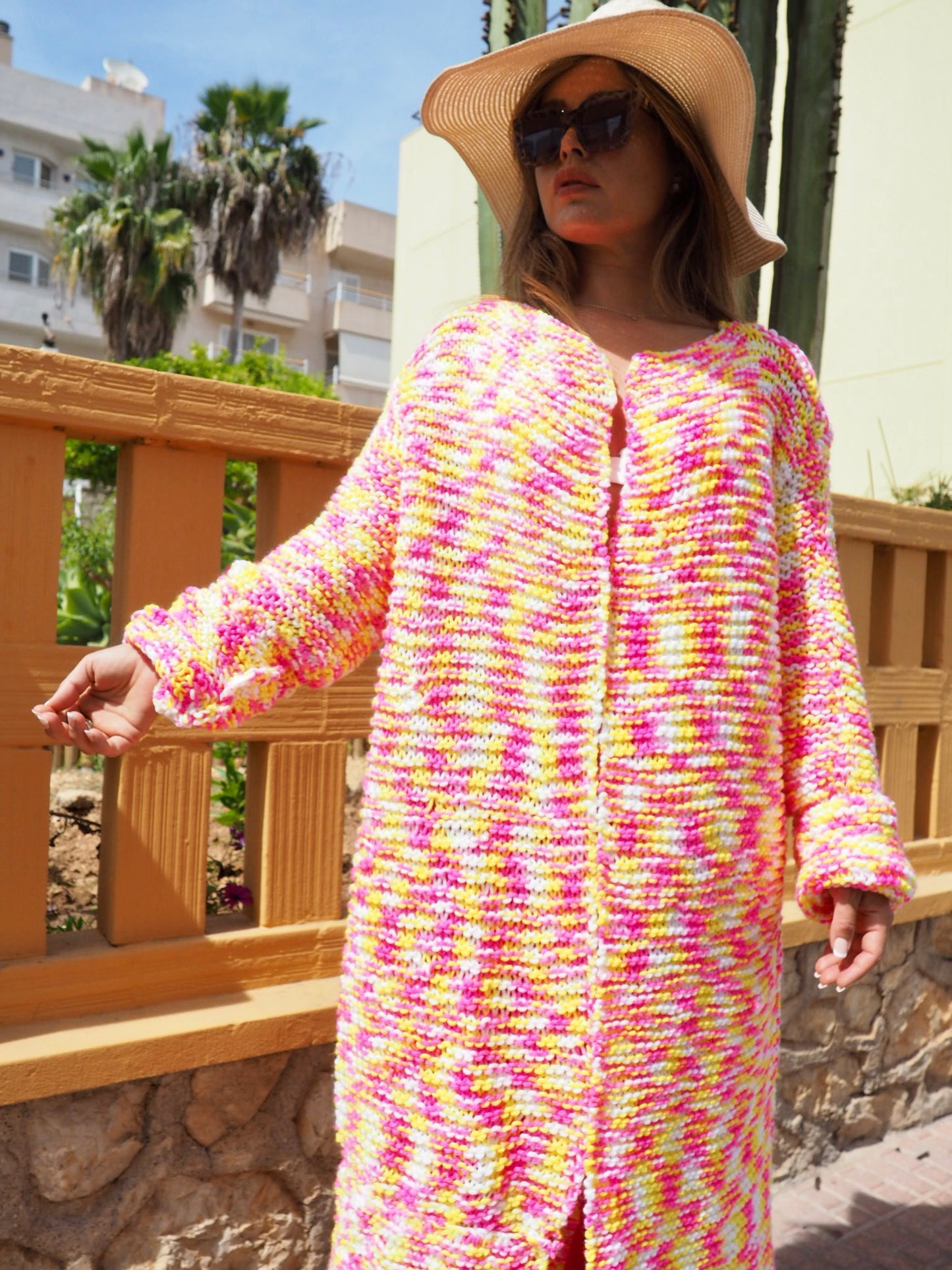 Hand knitted pink and yellow jacket made in ibiza by Vagabond Ibiza