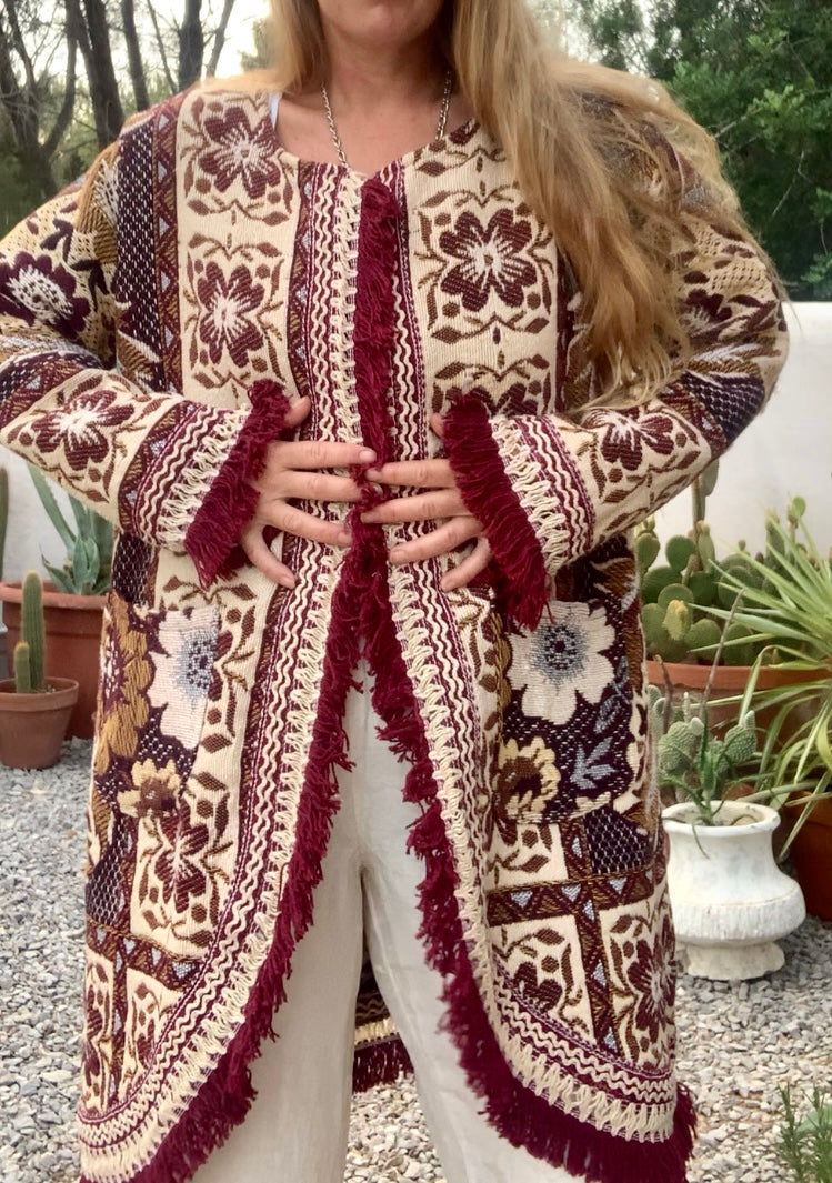 Up-cycled vintage blanket jackets by Vagabond Ibiza with a brown and cream woven outside textiles lined with patterns fleece