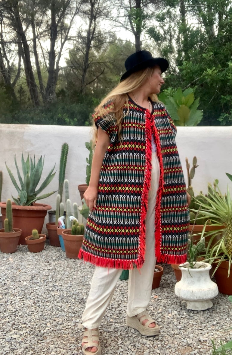 Up-cycled hand woven Morrocan textile waistcoat jacket by Vagabond Ibiza with red and black geometric design