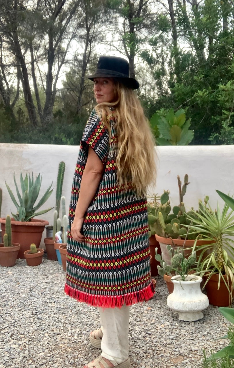 Up-cycled hand woven Morrocan textile waistcoat jacket by Vagabond Ibiza with red and black geometric design