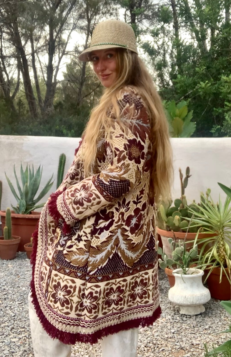 Up-cycled vintage blanket jackets by Vagabond Ibiza with a brown and cream woven outside textiles lined with patterns fleece