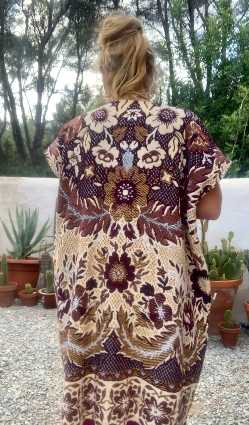 Up-cycled vintage blanket waistcoat jackets by Vagabond Ibiza with a brown and cream woven outside textiles lined with patterns fleece