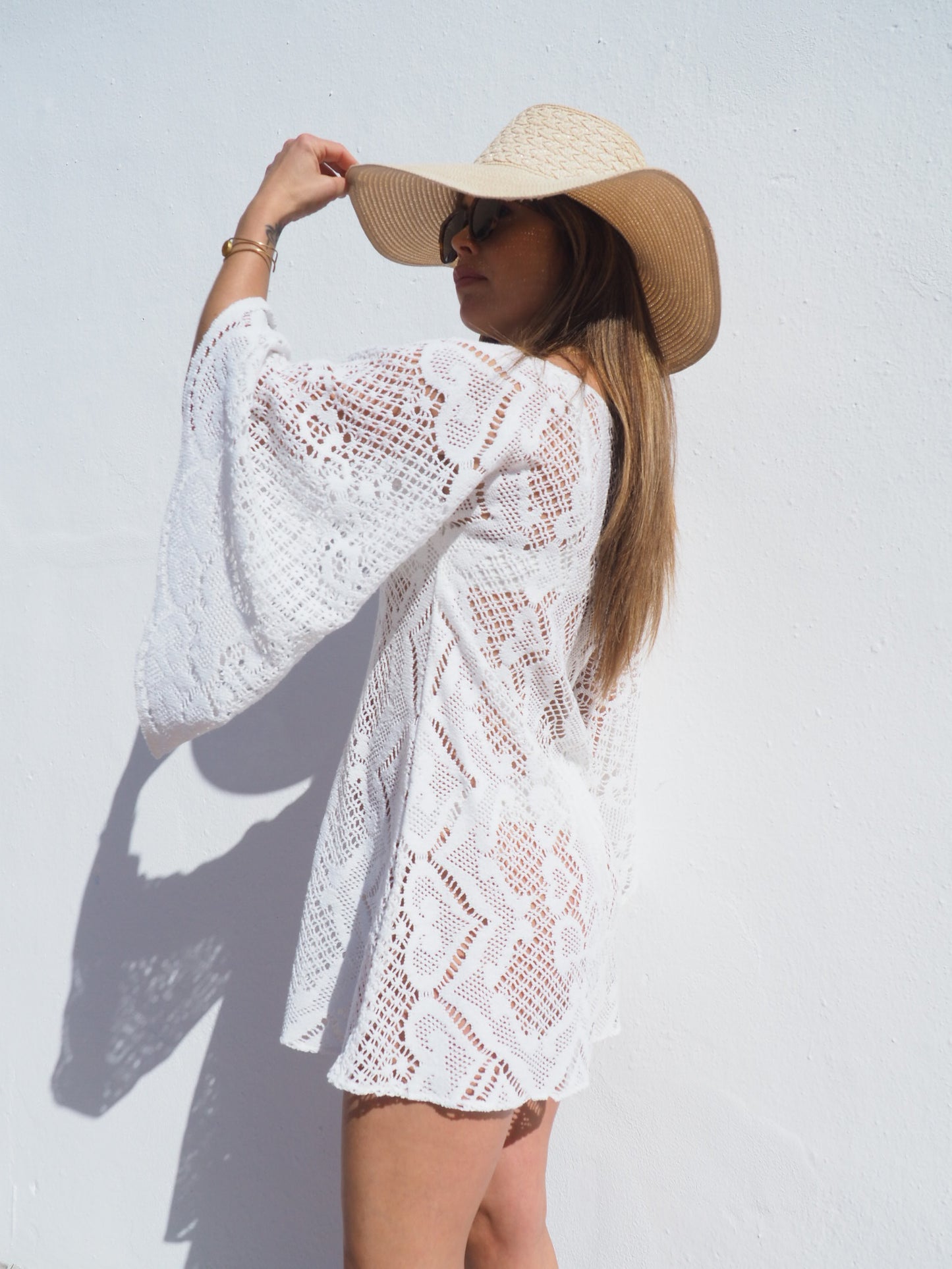 Vintage 1970’s white crochet dress up-cycled by Vagabond Ibiza with big bell sleeves