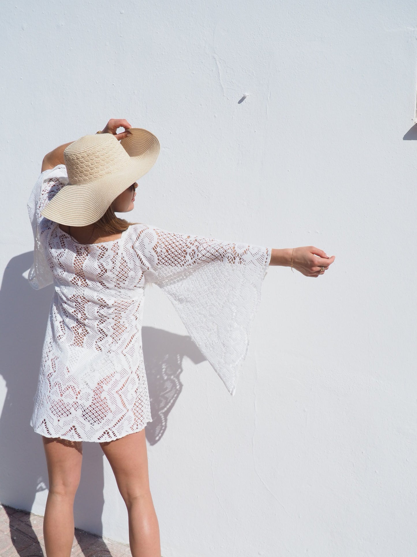 Vintage 1970’s white crochet dress up-cycled by Vagabond Ibiza with big bell sleeves