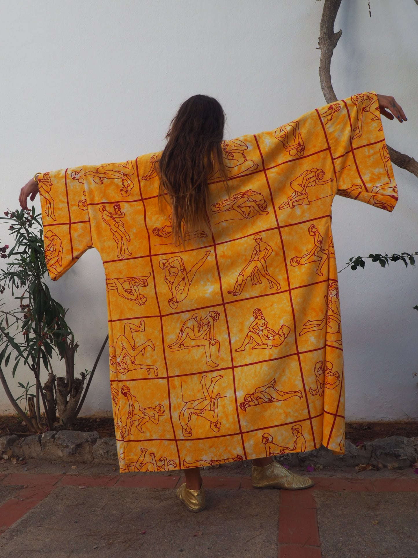 Up-cycled dressing gown with tantric sex position print by Vagabond Ibiza