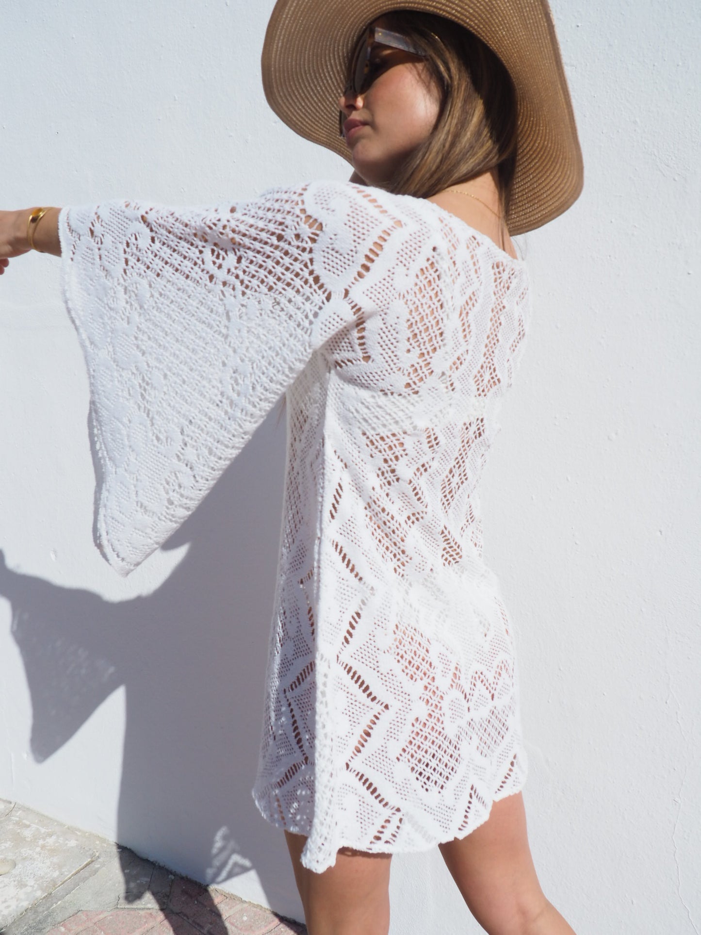 Vintage 1970’s white crochet dress up-cycled by Vagabond Ibiza with big bell sleeves