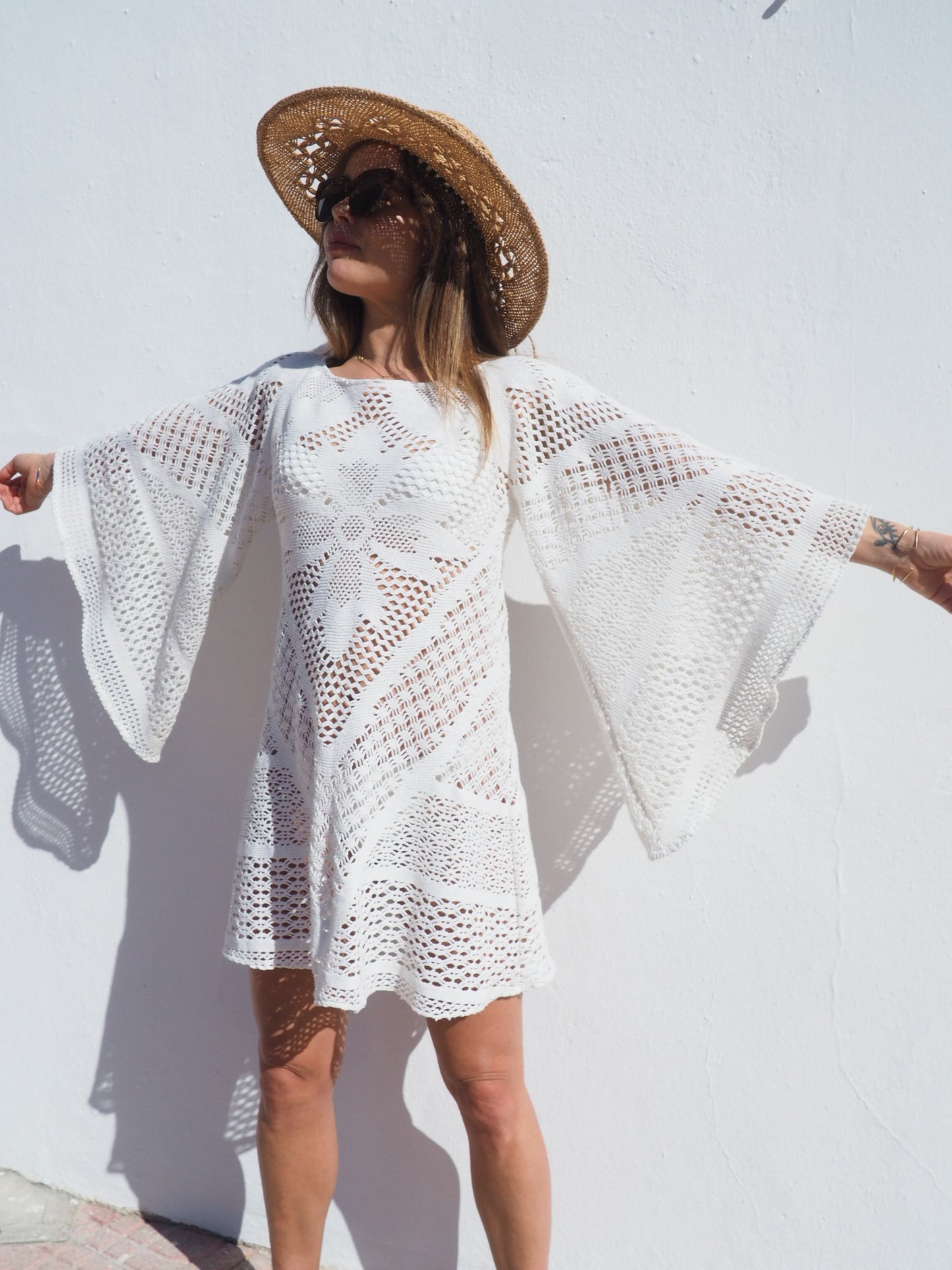 Vintage 1970’s white crochet dress up-cycled by Vagabond Ibiza with big bell sleeves