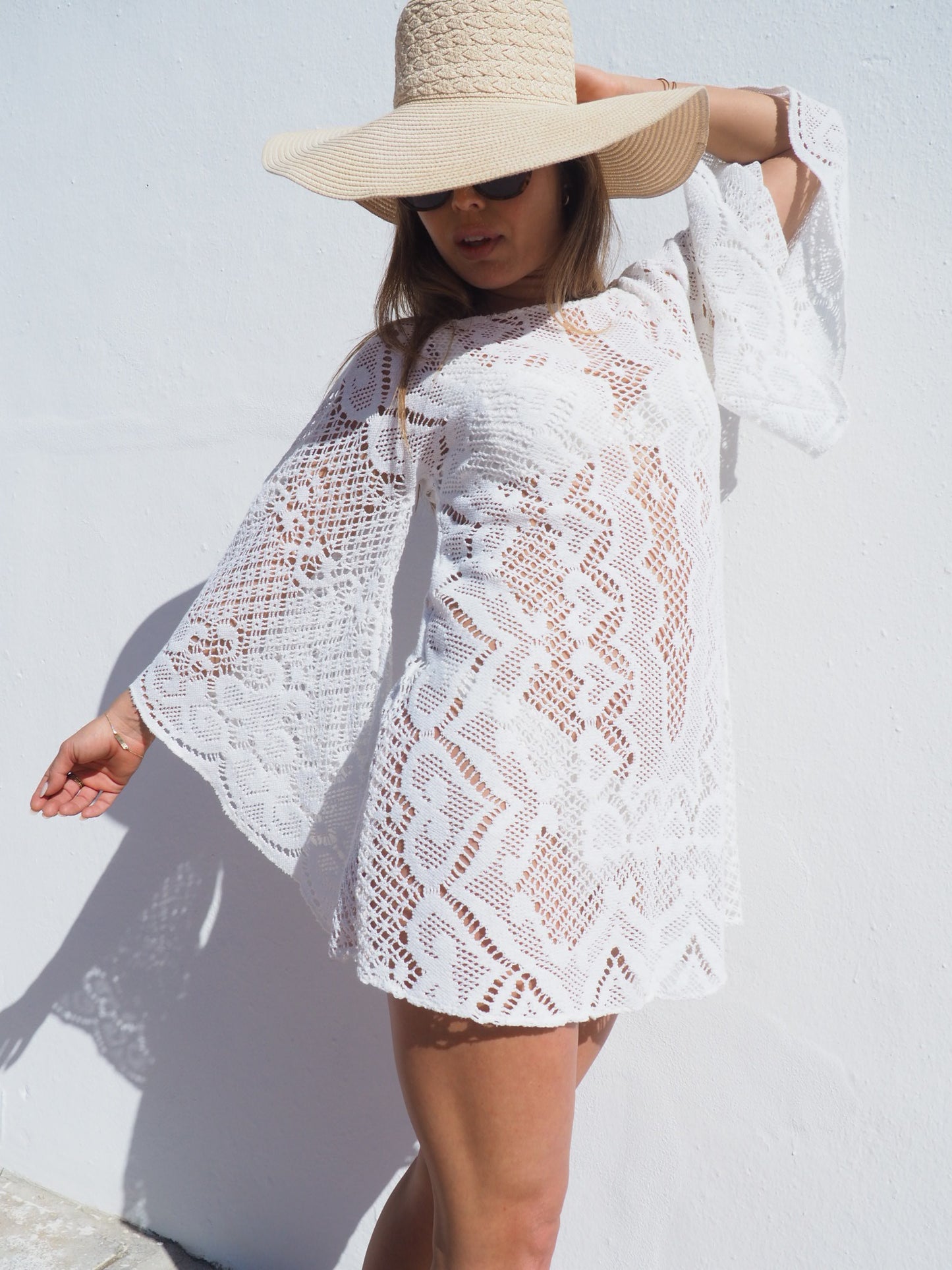 Vintage 1970’s white crochet dress up-cycled by Vagabond Ibiza with big bell sleeves