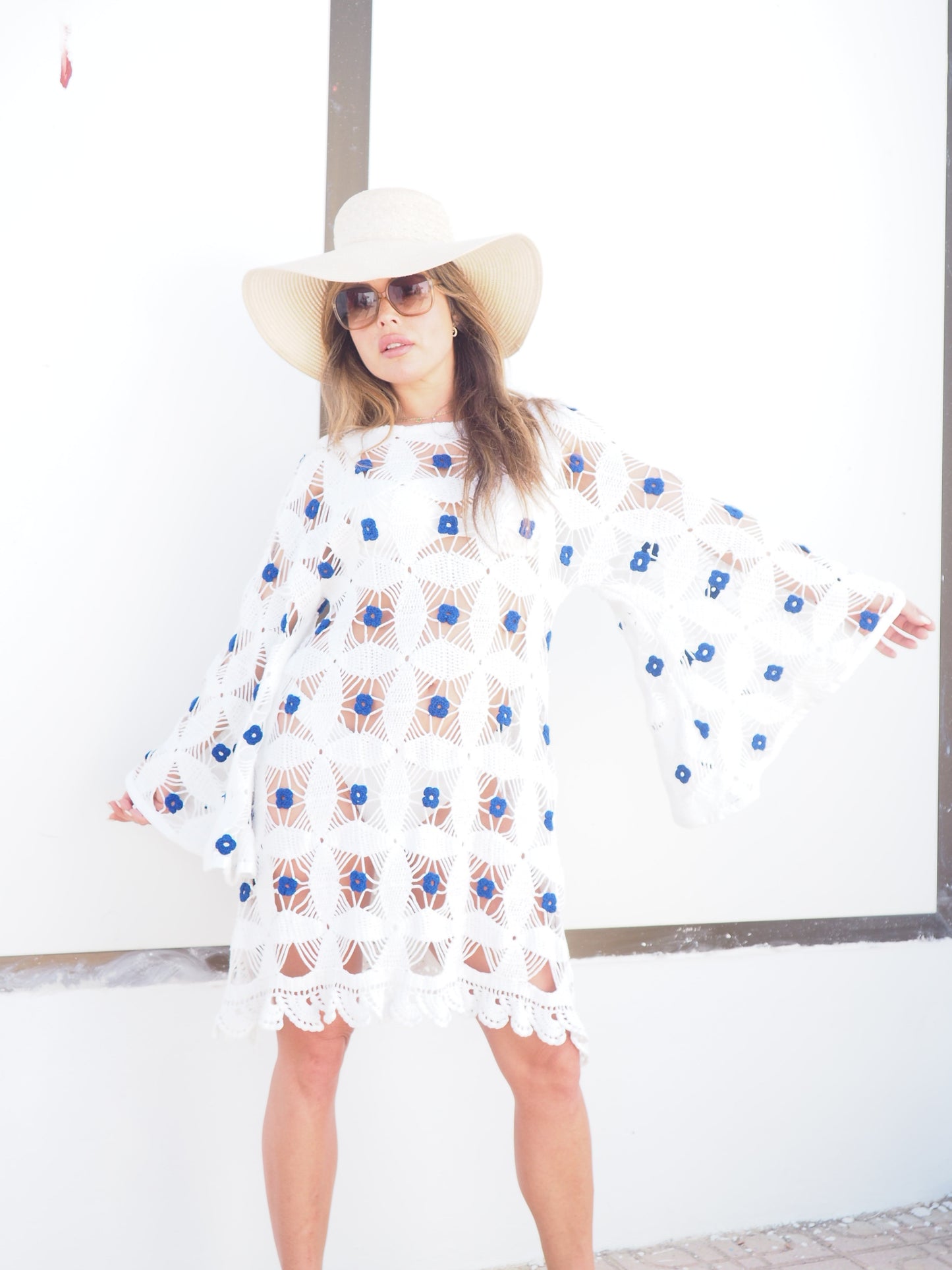 Amazing handmade vintage crochet textiles up-cycled bell sleeve dress with blue flower details by Vagabond Ibiza