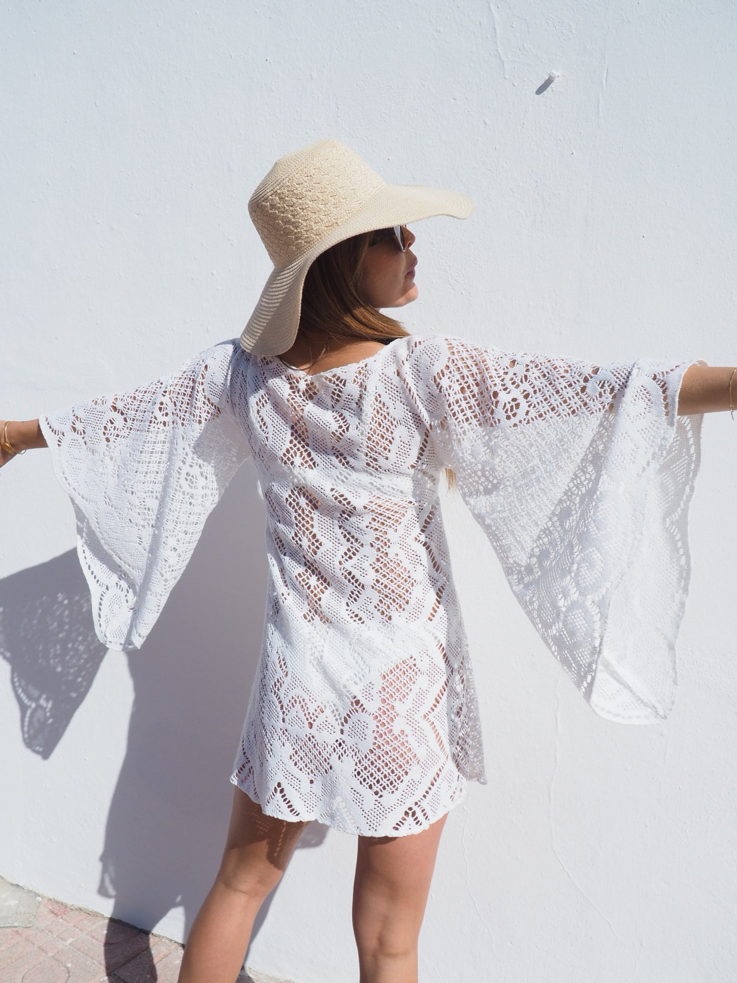 Vintage 1970’s white crochet dress up-cycled by Vagabond Ibiza with big bell sleeves