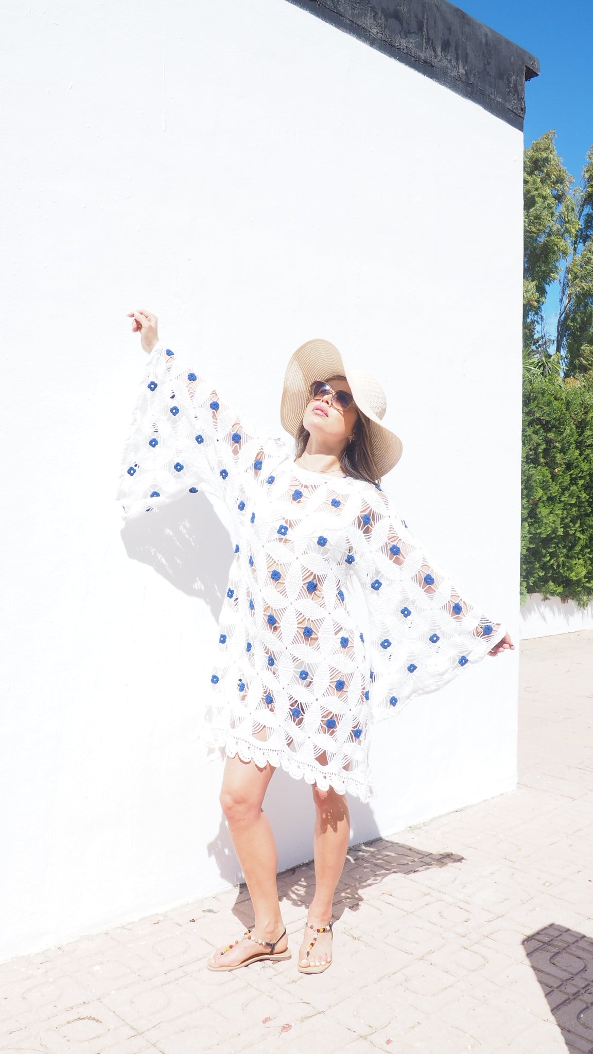 Amazing handmade vintage crochet textiles up-cycled bell sleeve dress with blue flower details by Vagabond Ibiza