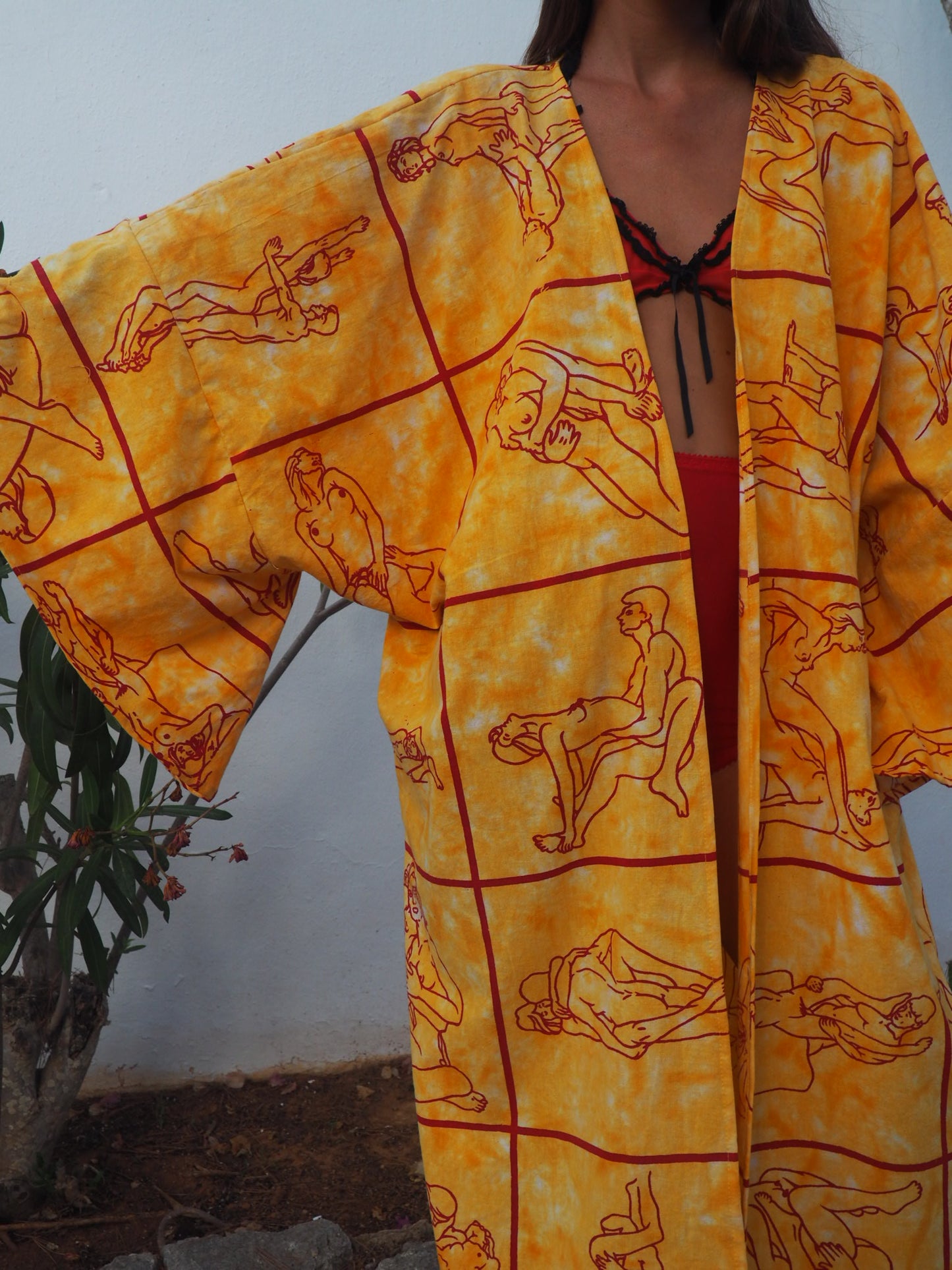 Up-cycled dressing gown with tantric sex position print by Vagabond Ibiza